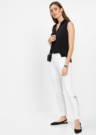 Spodnie z gumką w talii i haftem